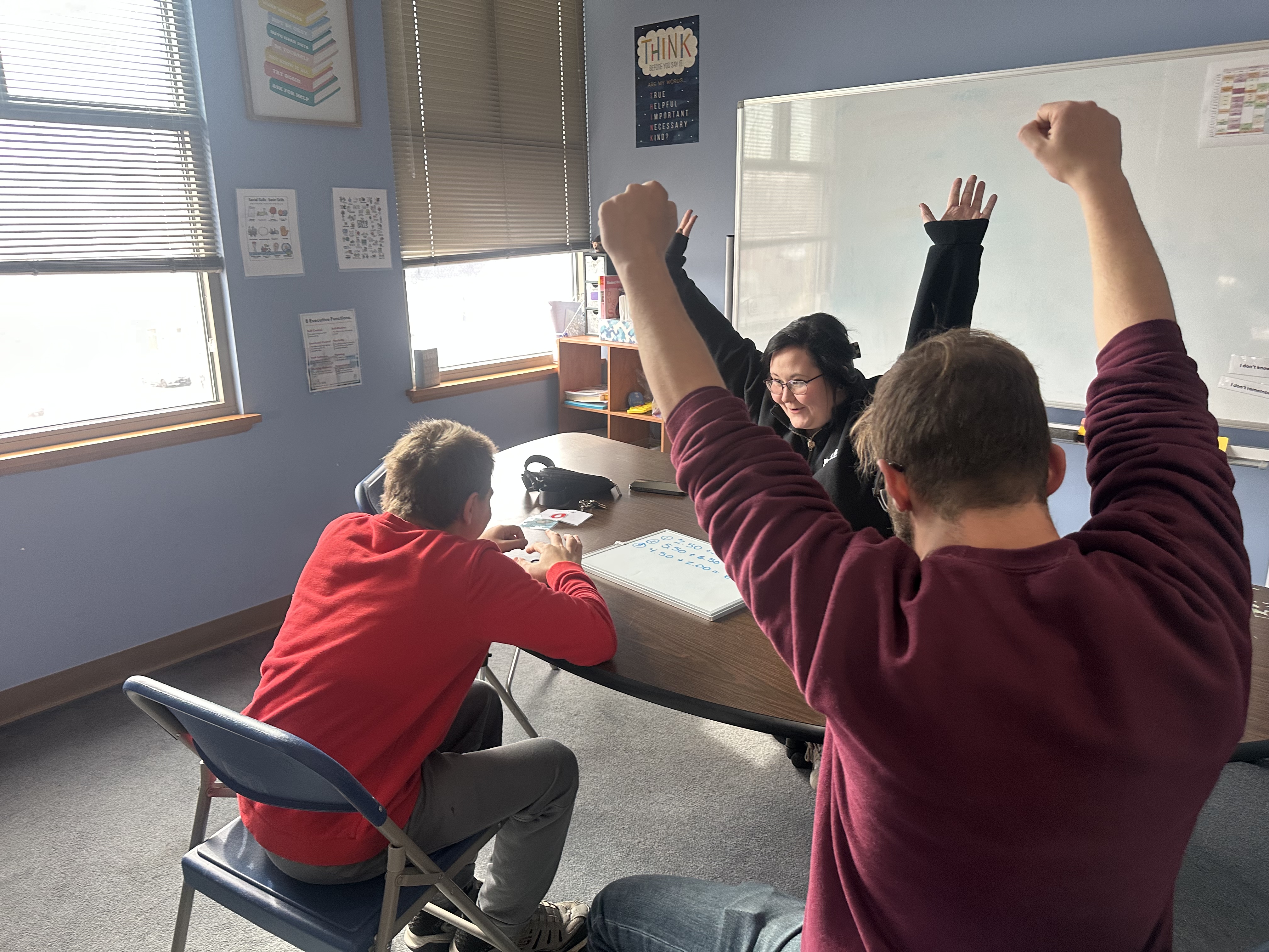 PAAL staff partnering with a student in a community setting
